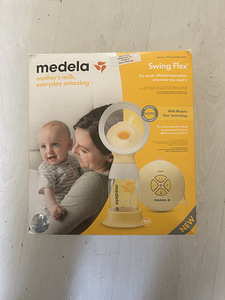 Молокоотсос Medela swing (2 фото из 2)