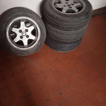 Алюминиевые литые диски с резиной R14х4 от Mazda 323