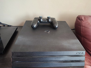 PS4 Pro 1TB (2 фото из 2)