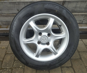 14-дюймовые литые диски 4x100 (Mazda) (2 фото из 3)