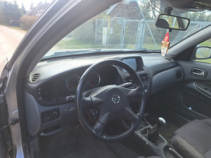 Nissan Almera (8 фото из 11)