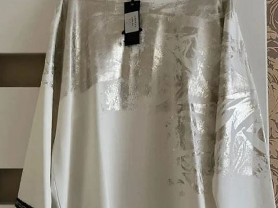 Новый. Подходит для размеров XL, XXL