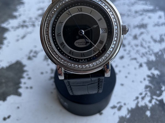Parmigiani Toric diamond bezel.