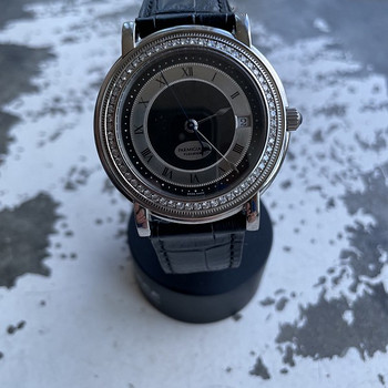 Parmigiani Toric diamond bezel.