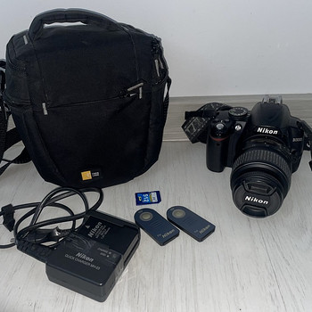 Nikon D3000 - Зеркальный фотоаппарат