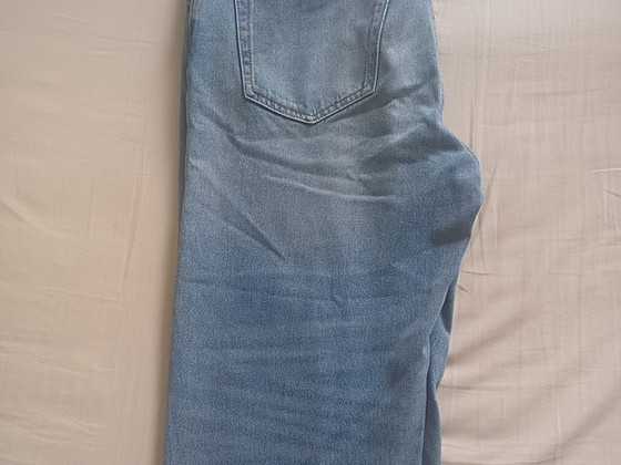 Helesinised loose fit teksad