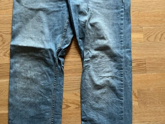 Светло-синие джинсы Wrangler, размер 46