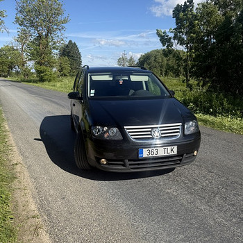 М: Volkswagen Touran