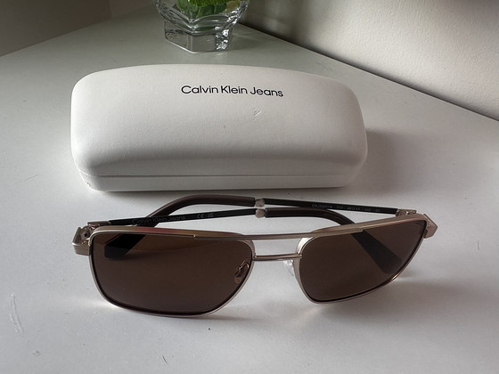 Calvin Klein meeste päikeseprillid