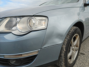 Helesinine automaatkastiga Volkswagen Passat 2005 (5 foto / 14)