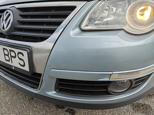 Helesinine automaatkastiga Volkswagen Passat 2005 (6 foto / 14)