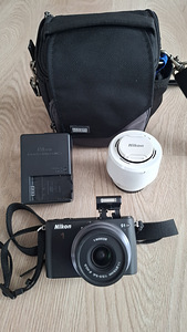 Фотоаппарат Nikon S1 (3 фото из 4)