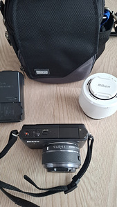 Фотоаппарат Nikon S1 (4 фото из 4)