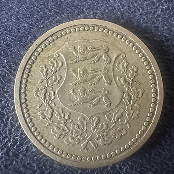Монета 25 senti 1928 года
