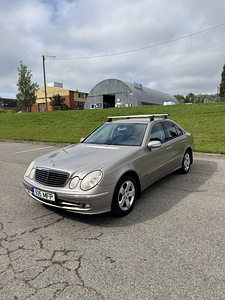 Mercedes-Benz E 200 1.8 120 кВт (1 фото из 11)