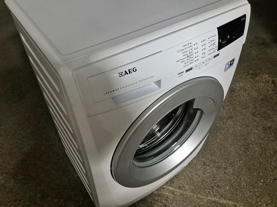 Стиральная машина Aeg LFJ64702 7 кг 1400 об/мин