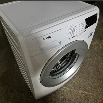 Стиральная машина Aeg LFJ64702 7 кг 1400 об/мин