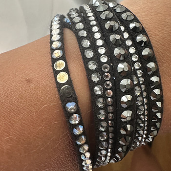 Женский браслет Swarovski.