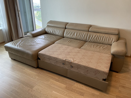 Кожаный угловой диван 265x95