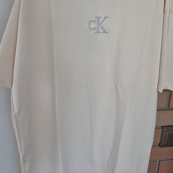 Продам новое платье ck l