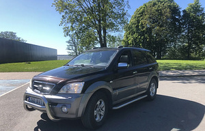Kia Sorento АКПП бензин+LPG (2 фото из 13)