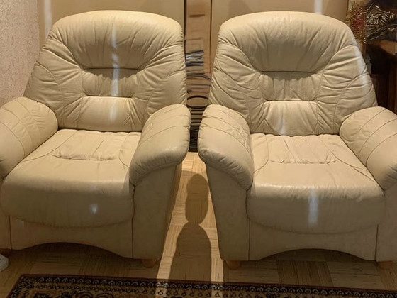 Leather sofa and two armchairs