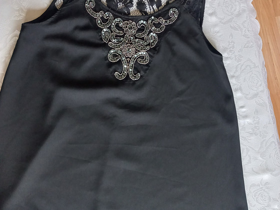 Must topp / top / pluus. Suurus sobib M-L.