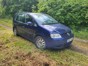 Volkswagen Touran 1,9 74 kw 7 kohta (4 foto / 8)
