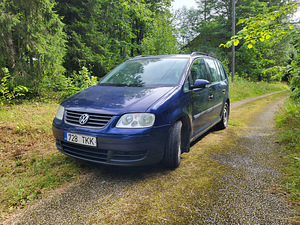 Volkswagen Touran 1,9 74 kw 7 kohta (5 foto / 8)