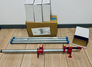 Kaheksast 3/4” toruklambrist koosnev komplekt koos torudega (1 foto / 5)