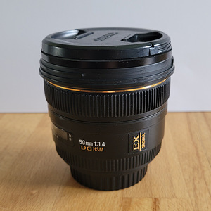 Sigma 50mm 1:1.4 EX DG HSM (Canon EF) + UV-фильтр Hoya HMC (1 фото из 4)
