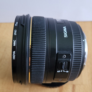 Sigma 50mm 1:1.4 EX DG HSM (Canon EF) + UV-фильтр Hoya HMC (3 фото из 4)