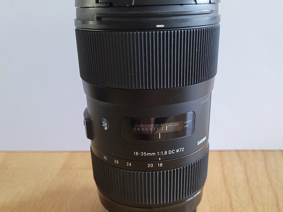 Sigma 18-35mm 1:1.8 DC HSM Art (Canon EF) + hood