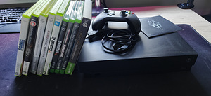 Xbox One X 1TB + 10 mängu (2 foto / 2)
