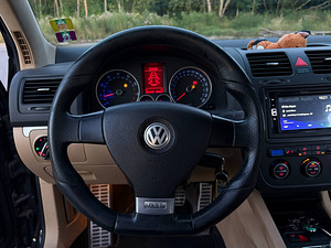 Volkswagen Golf GTi 2.0 147 кВт (10 фото из 12)