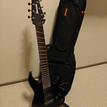 Ibanez RGMS7 Guitar + stand + case