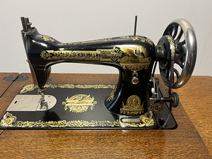 Singer 1910.a (7 фото из 8)