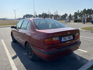 Nissan Primera (9 фото из 11)