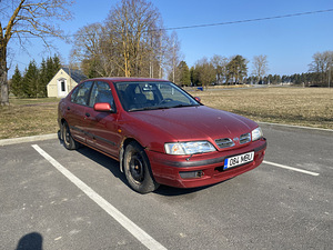 Nissan Primera (10 фото из 11)