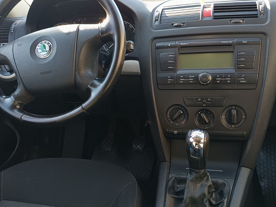 Skoda Octavia Combi (2008) — 1.6 Бензин (BSE), 75 kW, manual