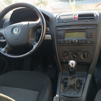 Skoda Octavia Combi (2008) — 1.6 bensii (BSE), 75 kW, manual