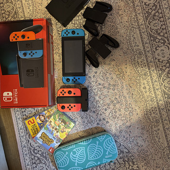 Nintendo Switch 1. generatsioon + 4 Joy-Con + 2 mängu