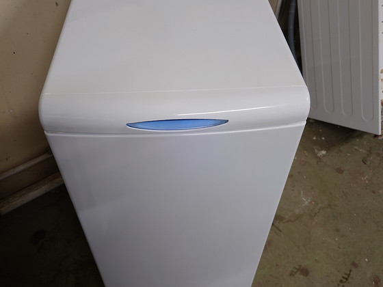 Стиральная машина Whirlpool с вертикальной загрузкой