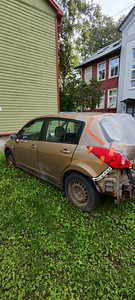 Продам аварийный Nissan Tiida (2 фото из 9)