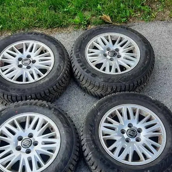 Зимние шины с шипами на дисках — 205/65 R15