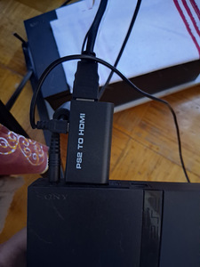 PlayStation 2 Slim (4 фото из 6)