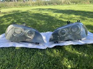 Esituled BMW X5 E70 pre-LCI OEM bi-xenon, vasak + parem (4 foto / 9)
