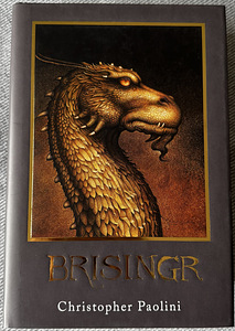 Четыре части серии «Eragon» Кристофера Паолини (3 фото из 4)