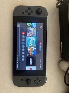 Nintendo Switch V2 + 7 игр + аксессуары (3 фото из 3)