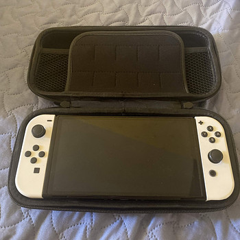Nintendo Switch OLED + Animal Crossing + tarvikud